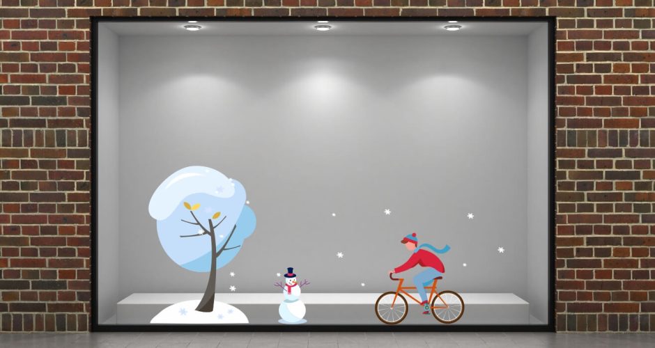 Αυτοκόλλητα Καταστημάτων - Χειμερινή σύνθεση με παιδί που κάνει ποδήλατο δέντρο και χιονάνθρωπο